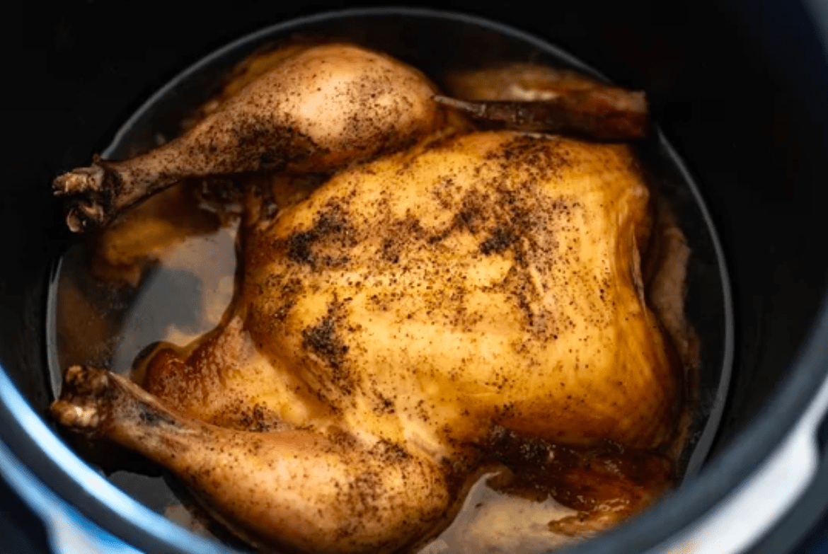 https://cdn-bhebn.nitrocdn.com/vVQasmYOqkVLnucVaRICytVEzScGvSwl/assets/static/optimized/rev-c393cc7/wp-content/uploads/2021/05/a-cooked-whole-chicken-in-a-slow-cooker.png